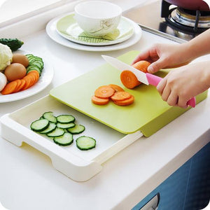 CHOPPING BOARD WITH INTEGRATED DRAWER